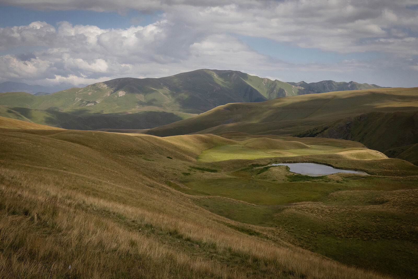 Beautiful landscape with mountains and cloudy sky in the Republic of Dagestan.